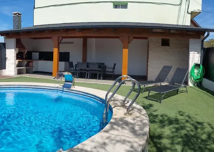 Casa Con Piscina Climatizada Y Barbacoa